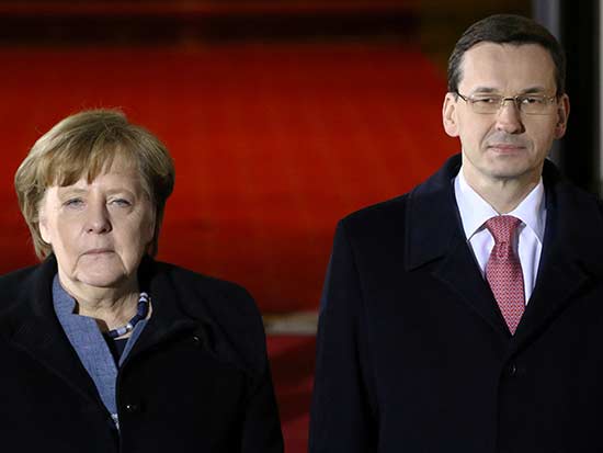 ראש ממשלת פולין מוראבייצקי וקנצלרית גרמניה מרקל / צילום: רויטרס - Slawomir Kaminski