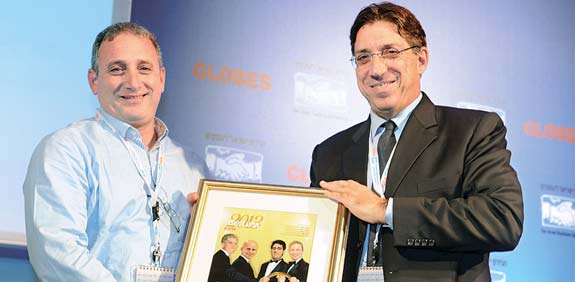 חגי גולן, נועם ברדין, ועידת ישראל לעסקים 2013 / צילום: תמר מצפי