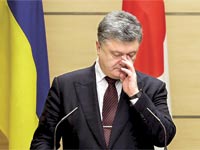נשיא אוקראינה פורושנקו, אתמול (ד'). טוען שלא עשה כל רע / צילום: רויטרס
