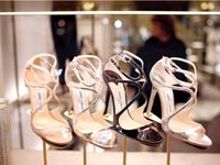 נעליים של ג'ימי צ'ו. התאוששות במחיר המניה / צילום: בלומברג