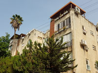 הבניין ברחוב בראשית ברמת השרון/ צילום: איל יצהר