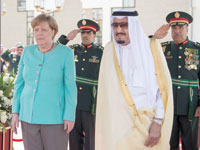 אנגלה מרקל והמלך הסעודי סלמאן בריאד/ צילום:רויטרס