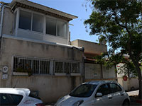 בית בשכונת שפירא בתל אביב, שבה קרקעות רבות רשומות במושע / צילום: איל יצהר, גלובס