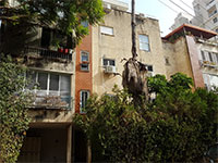 הבניין ברחוב בראשית 2 ברמה"ש. חיזוק מבנים לא מכשיר עבריינות  / צילום: איל יצהר, גלובס