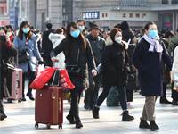 תושבי סין עם מסיכות פנים / צילום: Koki Kataoka, רויטרס
