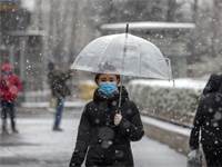 בהלת וירוס הקורונה בבייג'ינג, סין / צילום: Mark Schiefelbein, Associated Press
