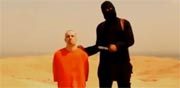 עיתונאי מוצא להורג ע"י דאעש / צילום: מתוך הוידאו