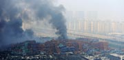 פיצוץ בטיינג'ין בסין / צילום: רויטרס
