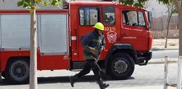 נפילת גראד קטיושה בבאר שבע חמאס פיגוע מכבי אש שריפה / צלם : רויטרס	