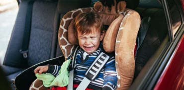 ילד בוכה בנסיעה / צילום: שאטרסטוק