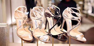 נעליים של ג'ימי צ'ו. התאוששות במחיר המניה / צילום: בלומברג