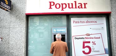 סניף בנק פופולר בספרד / צילום: רויטרס