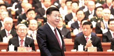 נשיא סין, שי ג'ינפינג. S&P הורידה את דירוג החוב ל־A פלוס / צילום: China Daily / רויטרס