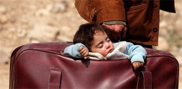 פליט סורי / צילום: Omar Sanadiki, רויטרס
