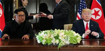 המפגש בין דונלד טראמפ לקים ג'ונג און / צילום: רויטרס