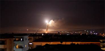 שיגור רקטה מעל סוריה / צילום: רויטרס