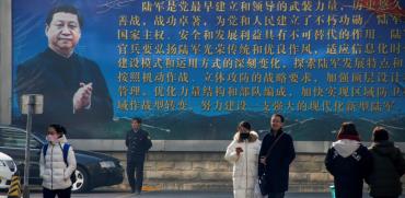 כרזה עם דיוקן הנשיא שי ג'ינפינג / צילום: רויטרס, Thomas Peter