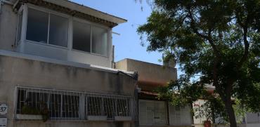 בית בשכונת שפירא בתל אביב, שבה קרקעות רבות רשומות במושע / צילום: איל יצהר, גלובס