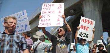 מפגינים נגד הסכום הגבוה שגובות אובר וליפט / צילום: רויטרס