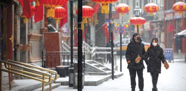 תיירים ברחובות סין / צילום: Mark Schiefelbein, Associated Press