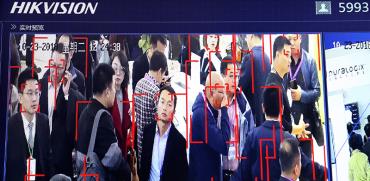 טכנולוגיית זיהוי פנים של חברת Hikvision הסינית / צילום: Ng Han Guan, Associated Press