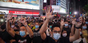 תושבי הונג קונג מפגינים נגד חוק הביטחון הלאומי, החודש / צילום: Vincent Yu, Associated Press