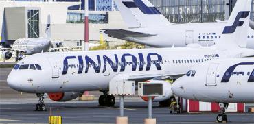 מטוסי חברת Finnair בנמל התעופה של הלסינקי / צילום: רויטרס