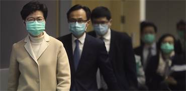 פוליטיקאים בהונג קונג בצל וירוס הקורונה / צילום: Achmad Ibrahim, Associated Press