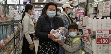 בהלת וירוס הקורונה בהונג קונג / צילום: Kin Cheung, Associated Press