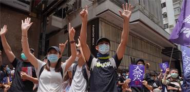 מפגינים בהונג קונג נגד נסיונות החקיקה החדשים של סין / צילום: Vincent Yu, AP