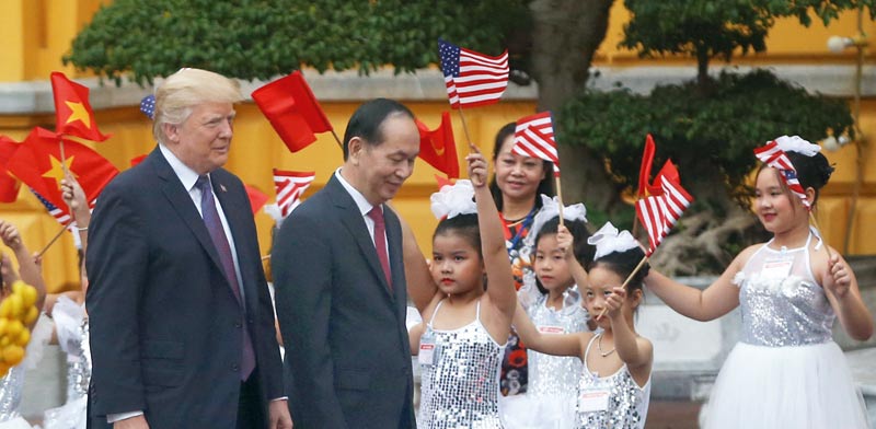 הנשיא טראמפ עם נשיא וייטנאם, טראן דאי קאנג  / צילום: רויטרס, Nguyen Huy Kham