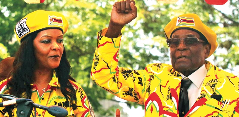 Philimon Bulawayo הנשיא מוגאבה ואשתו גרייס: רויטרס