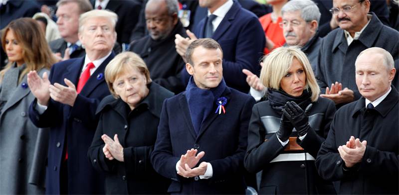 עמנואל מקרון, אנגלה מרקל, דונלד טראמפ וולדימיר פוטין במהלך טקס הזכרון בפריז / צילום: Reuters