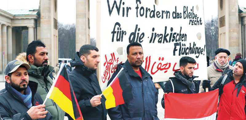 מחאה בברלין על גירוש פליטים / צילום: רויטרס  FABRICIO BENSCH