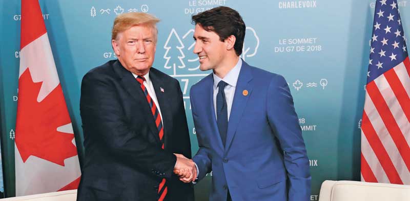 הנשיא טראמפ וראש ממשלת קנדה ג‘סטין טרודו/ צילום: רויטרס Leah Millis 