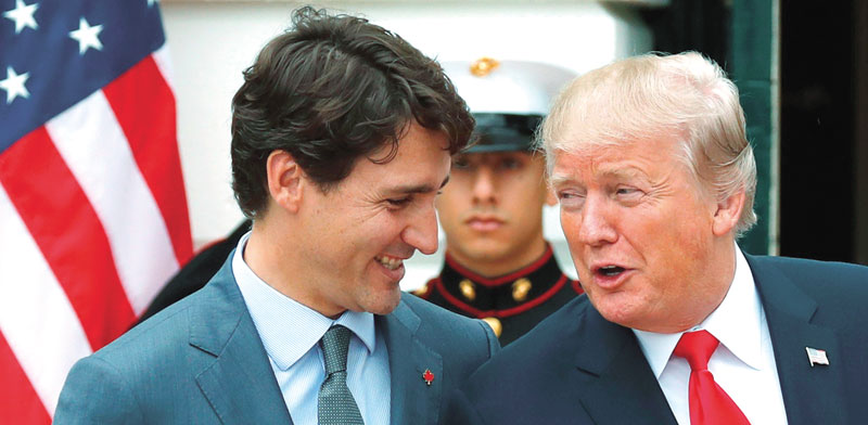 הנשיא טראמפ וראש ממשלת קנדה  / צילום: רויטרס, Jonathan Ernst