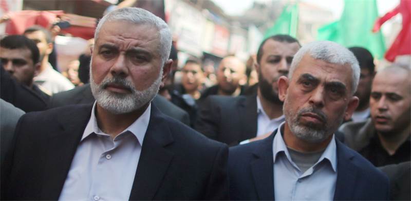 Hamas leaders Ismail Haniyeh and Yahya Sinwar  photo Mohammed Sale, Reuters