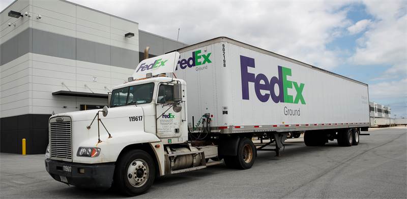 משאית של FedEx / צילום: Kamil Krzaczynski, רויטרס