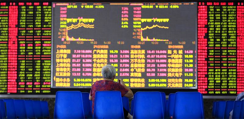 מסכי שוק המניות בשנחאי, סין / צילום: Reuters