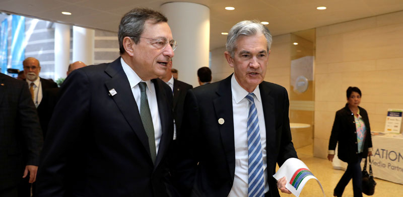 נגיד הפד ג’רום פאואל ונשיא ה־ECB מריו דראגי /צילום: רויטרס, Yuri Gripas
