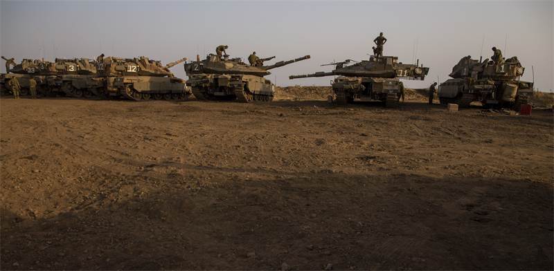 טנקים של צה"ל ברמת הגולן / צילום: Ariel Schalit, AP