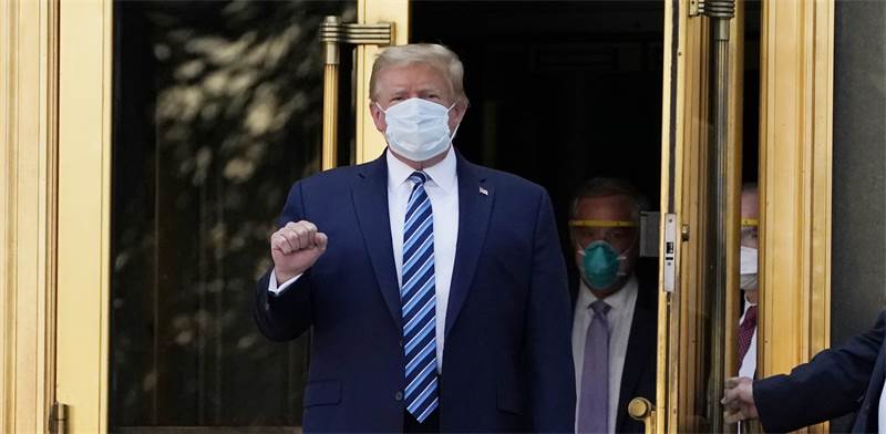 נשיא ארה"ב דונלד טראמפ השתחרר מבית החולים וולטר ריד / צילום: AP