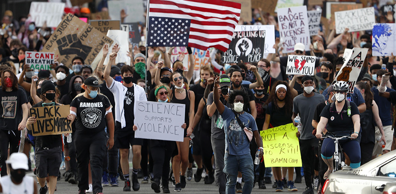 מתוך ההפגנה בדטרויט, מישיגן / צילום: Paul Sancya, Associated Press