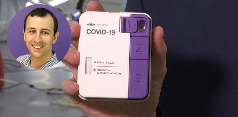 Adam de la Zerda and Visby Medical's miniature PCR device / Photo: Reuters