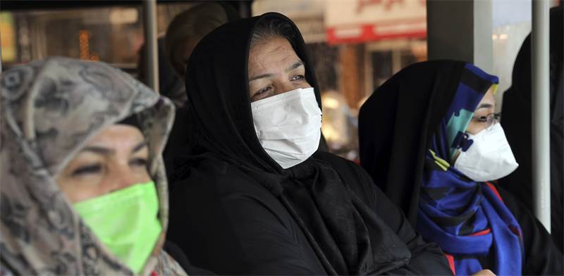 אזרחות איראניות לובשות מסכות מגן / צילום: Ebrahim Noroozi, AP