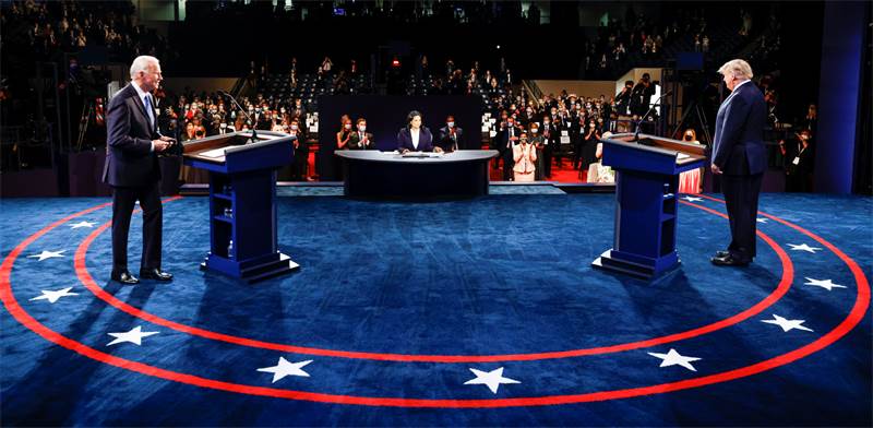 העימות הטלוויזיוני בין הנשיא טראמפ ולבין ג'ו ביידן / צילום: Jim Bourg, AP