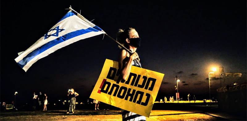 מפגינה בהפגנת העצמאים בגן בצ'רלס קלור, בתל אביב / צילום: שלומי יוסף, גלובס
